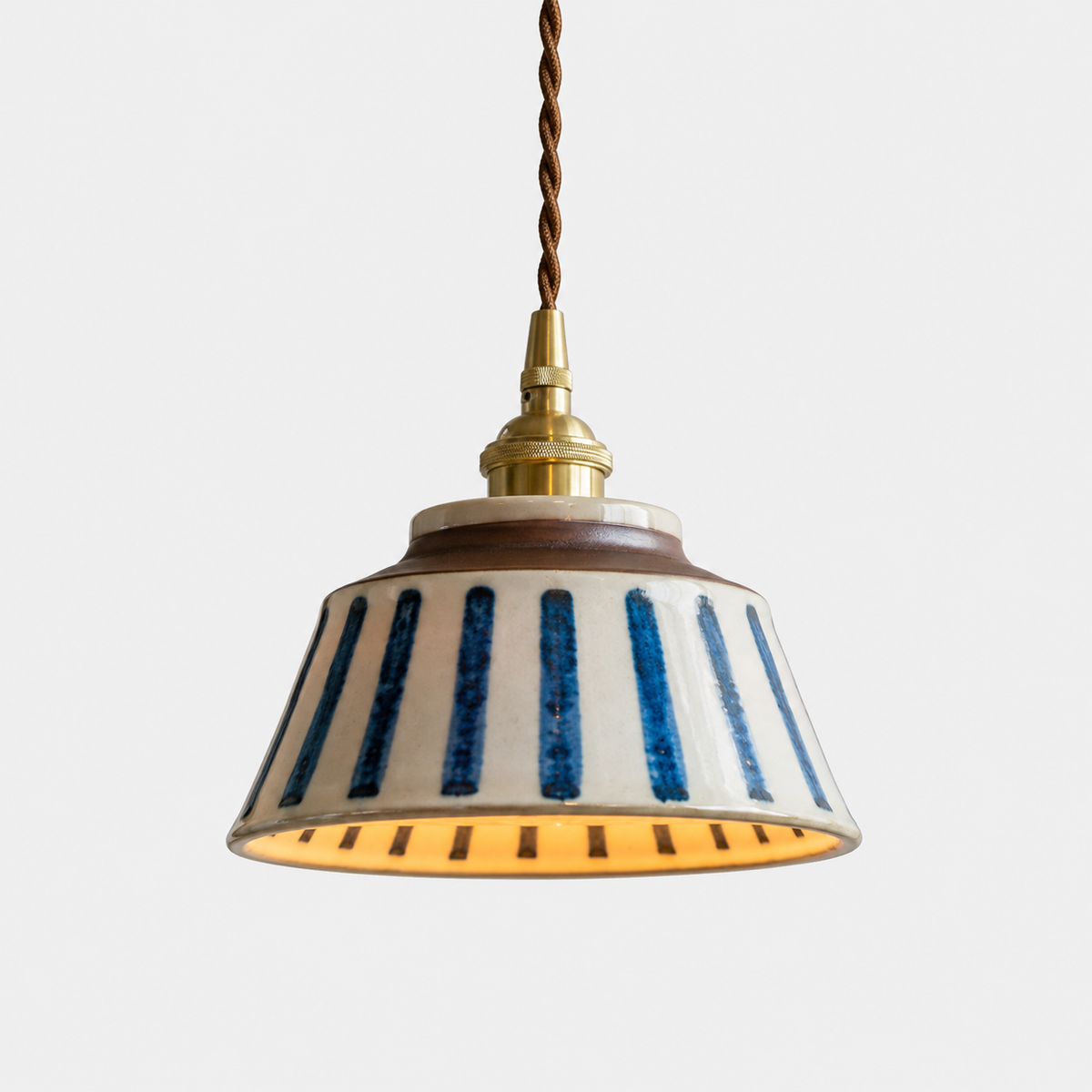 The Kiln, hand-painted ribbed ceramic pendant light with brass detail and fabric flex — Selden Home product photography