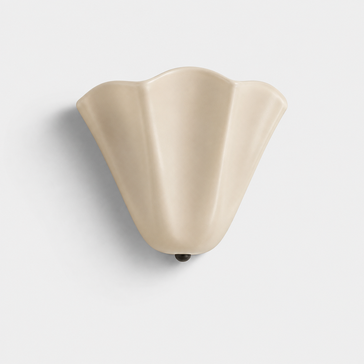 The Petal, sculpted amber glass wall light on a slim metal arm — Selden Home product photography