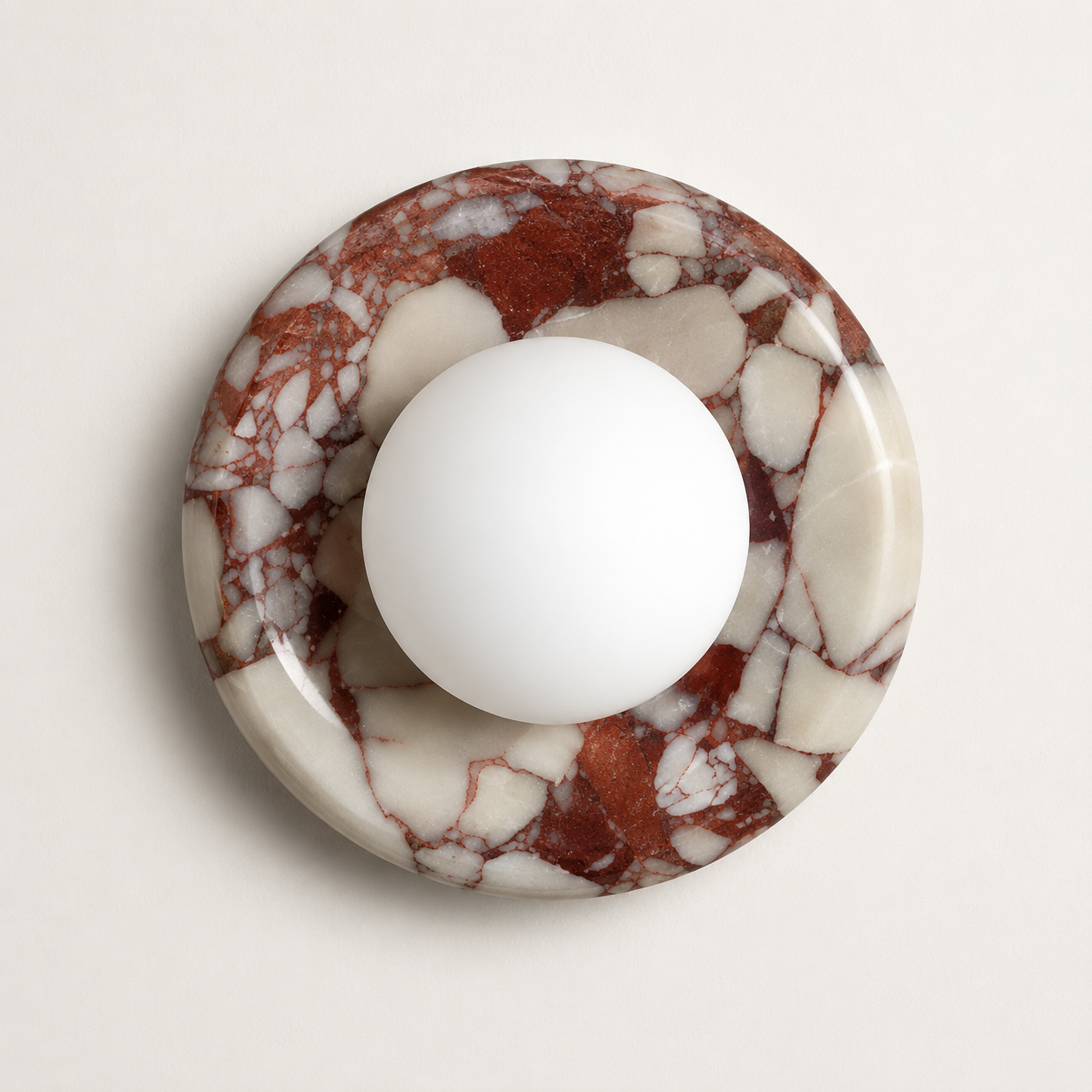 The Cameo, marble ring wall light with a frosted glass globe at its centre — Selden Home product photography