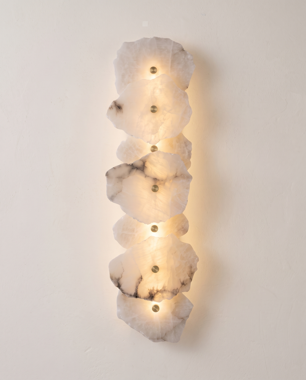 The Strata Wall Light – 7 Heads, backlit natural alabaster