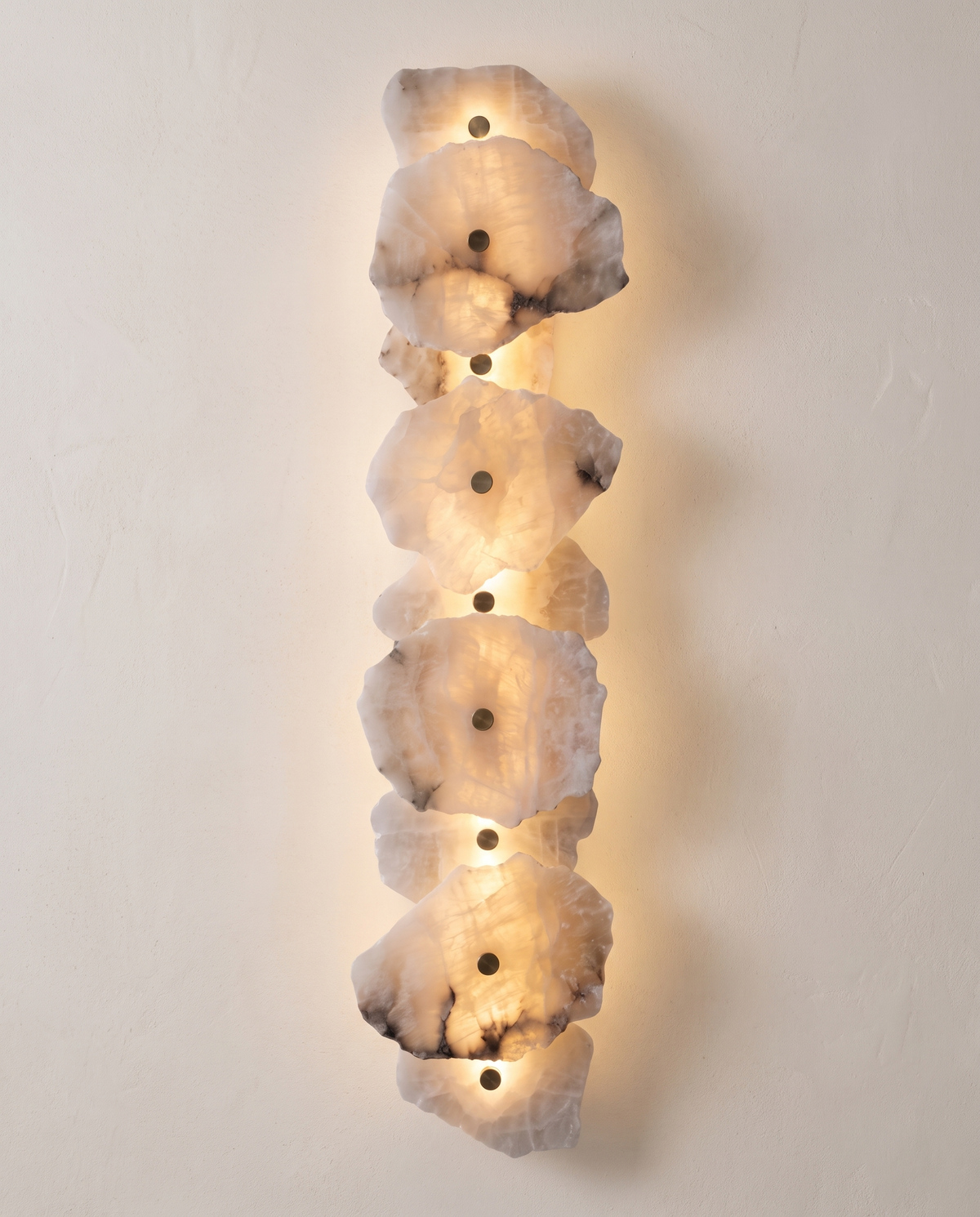 The Strata Wall Light – 9 Heads, backlit natural alabaster