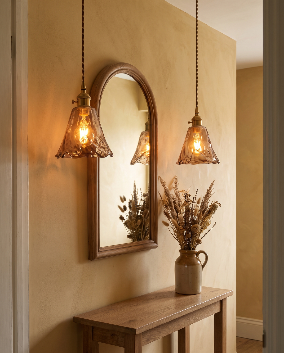 Two Tumbler Teardrop pendants above a hallway console and mirror