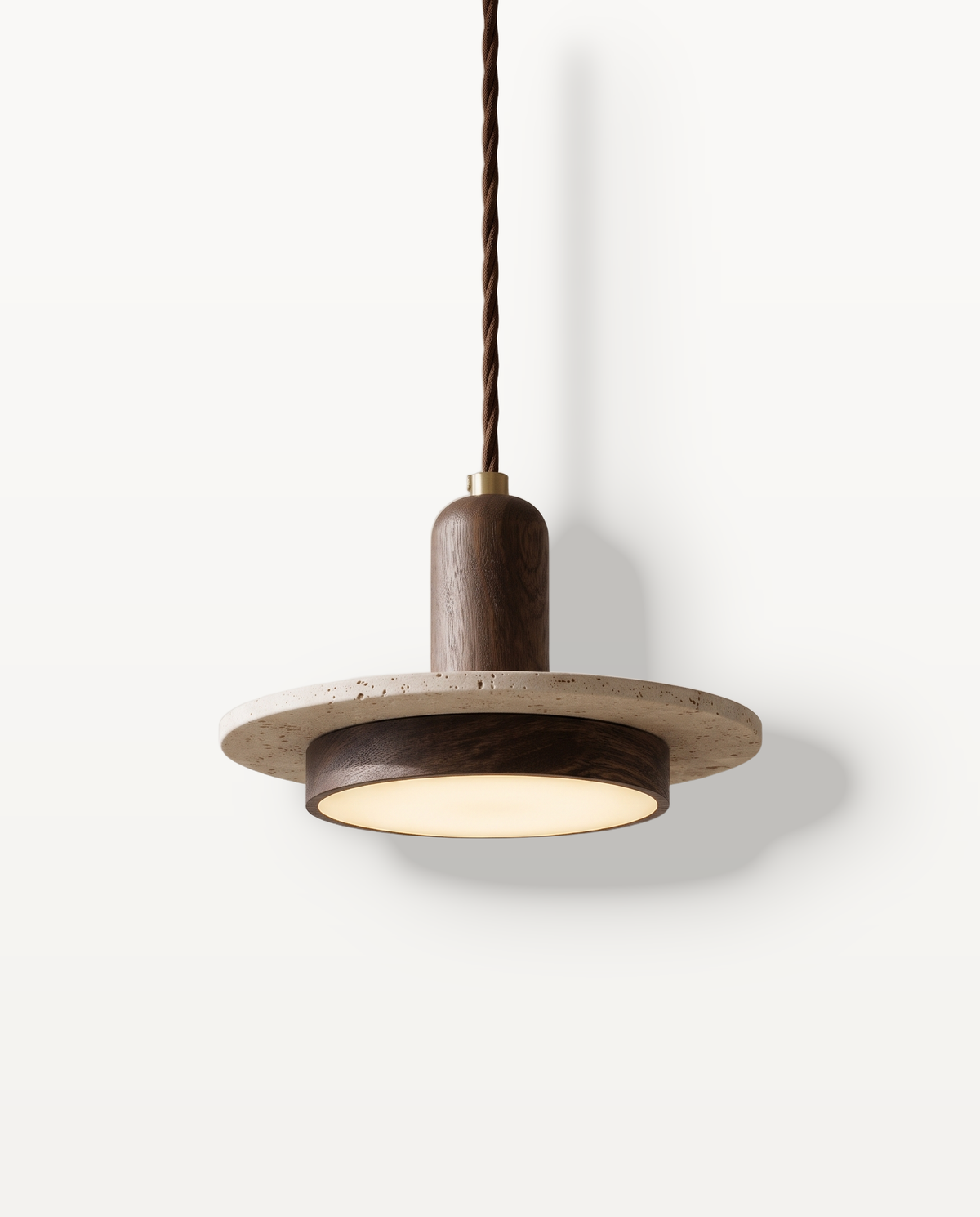 The Axis, travertine disc pendant light with a slim cylinder through its centre — Selden Home product photography