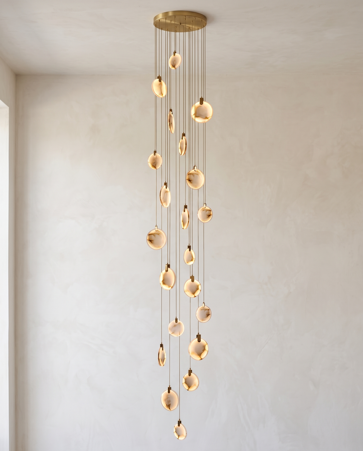 The Cascade alabaster disc chandelier for stairways — Selden Home (11)