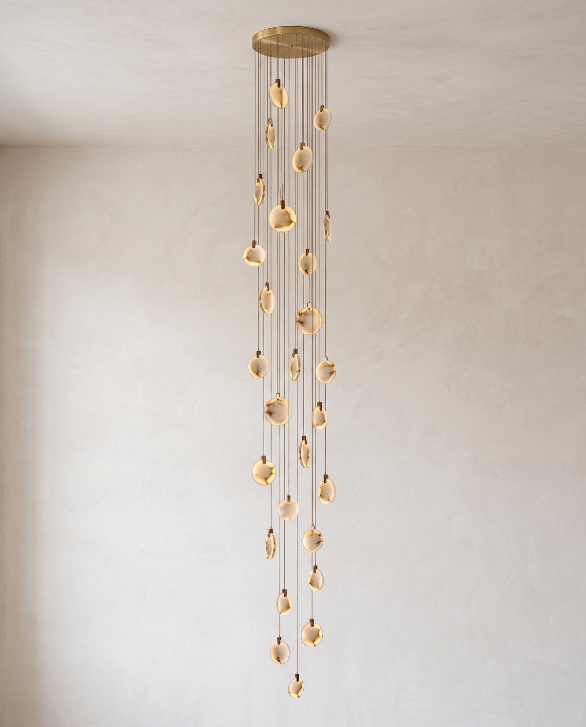 The Cascade alabaster disc chandelier for stairways — Selden Home (13)