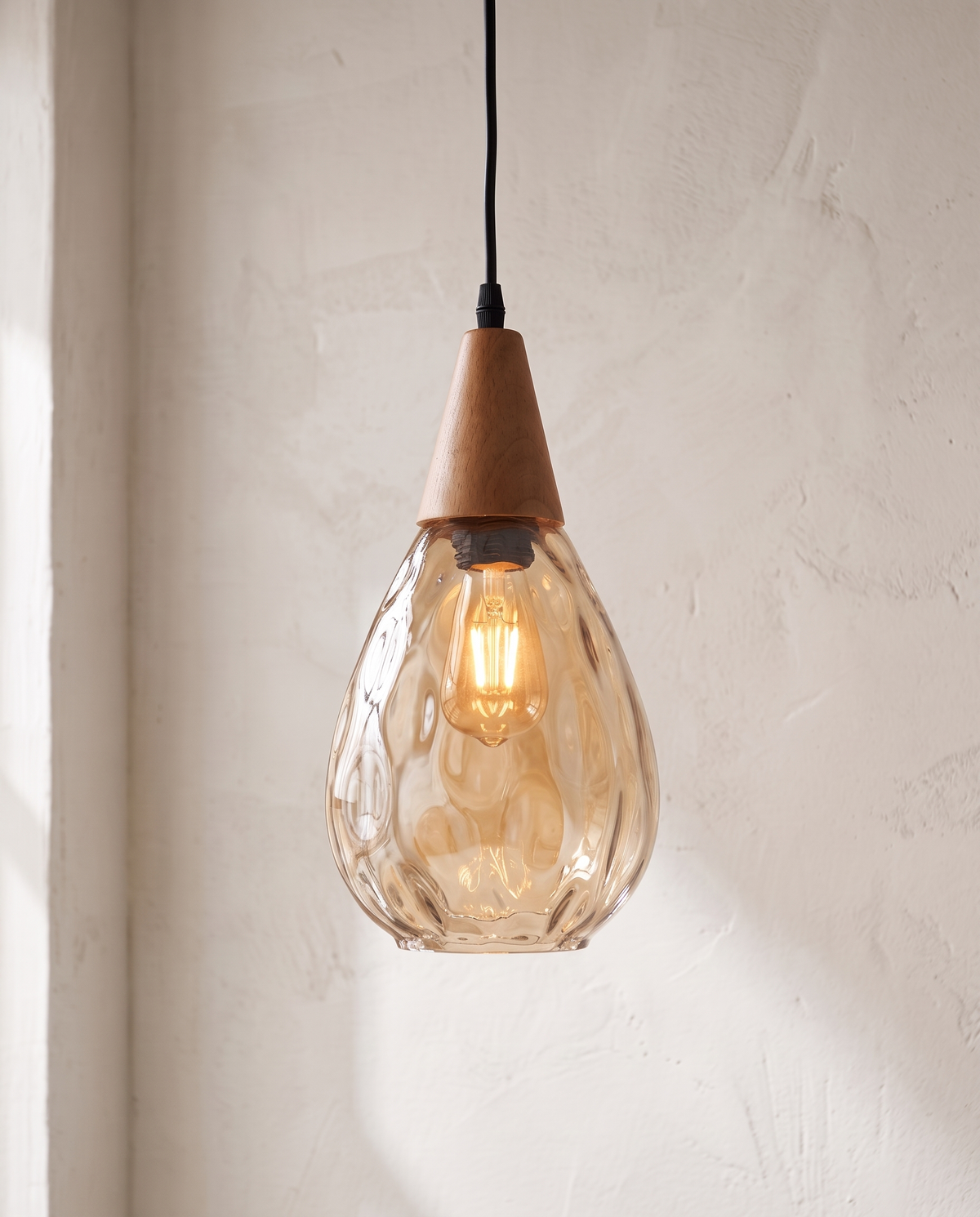 The Dew Pendant, amber textured glass
