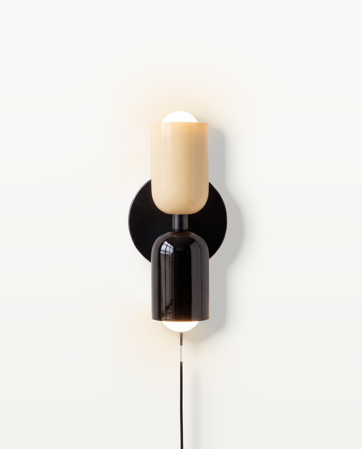The Duet Plug-in Wall Light in Cream & Jet
