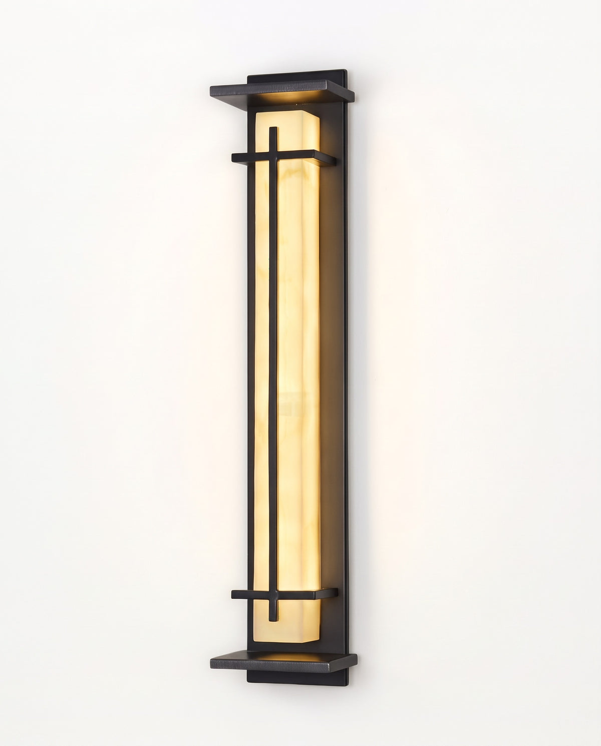 The Gatepost Outdoor Wall Light, a tall black frame around a glowing alabaster-effect panel