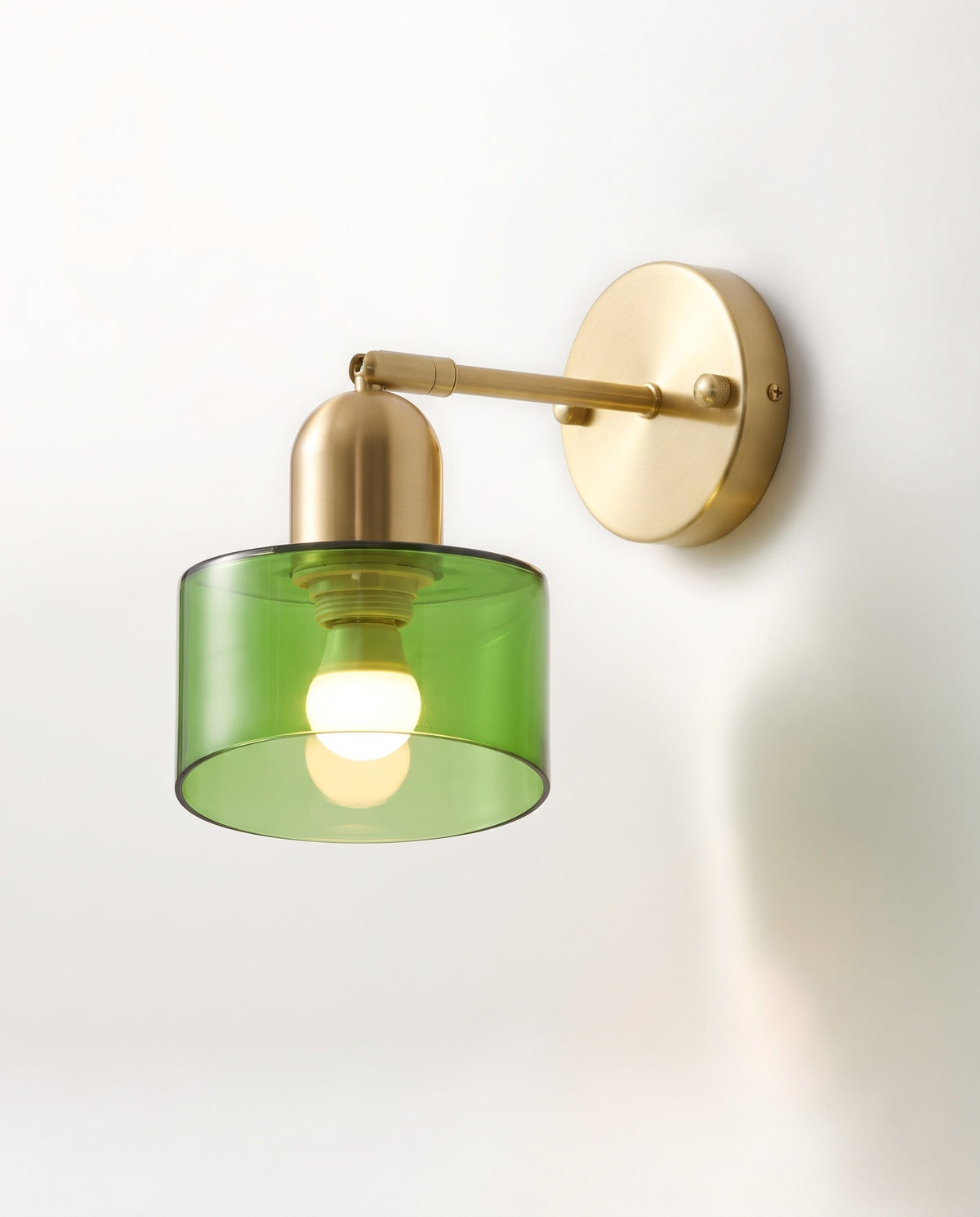 The Inkwell Wall Light with a clear bottle green glass shade