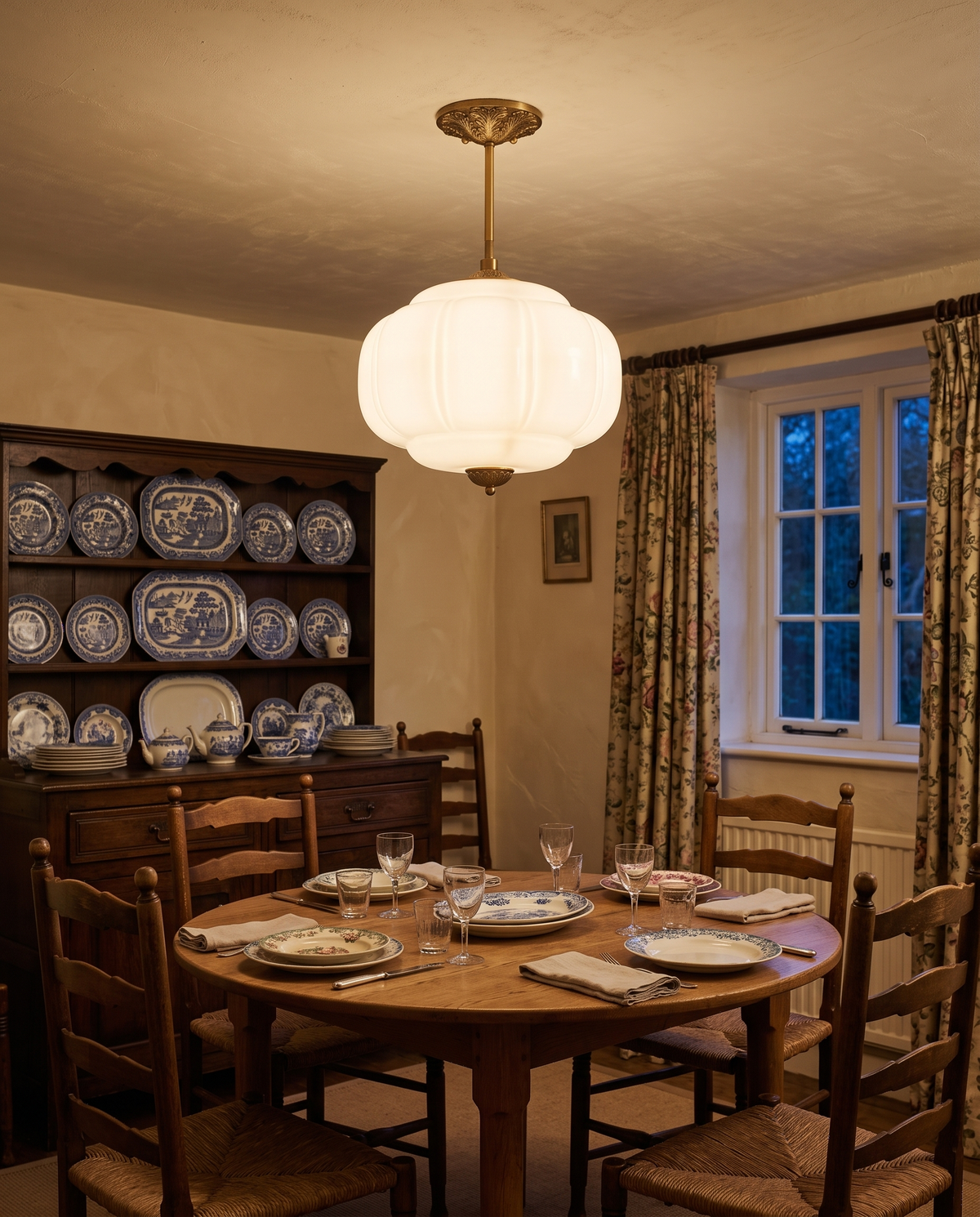 The Jade in opal and gold over a 1930s dining table