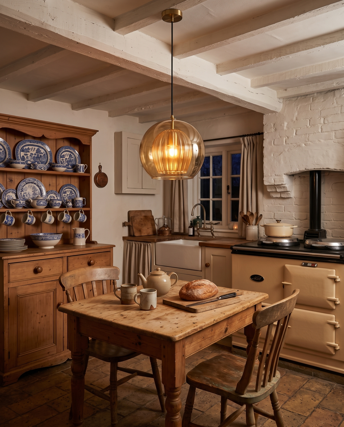 An amber Nest over a pine table in a cottage kitchen