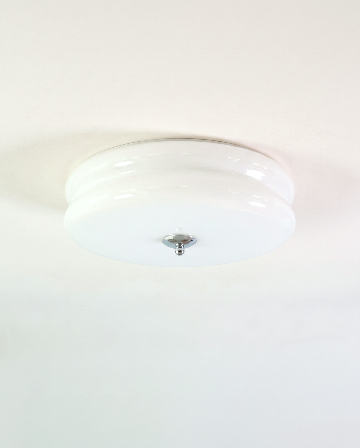 The Odeon Ceiling Light in Ivory glass with a chrome finial
