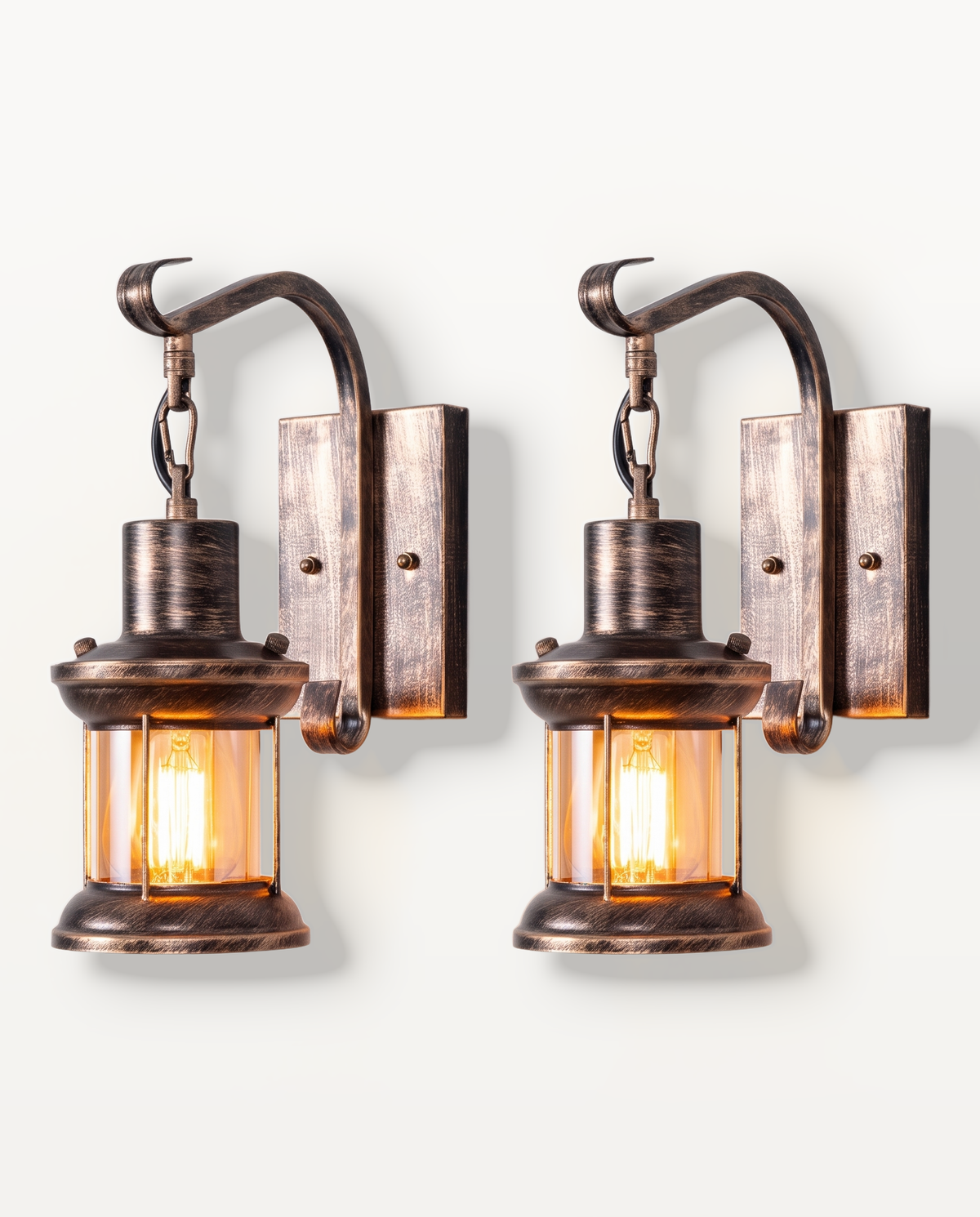 A pair of Ostler wall lights in Antique Bronze