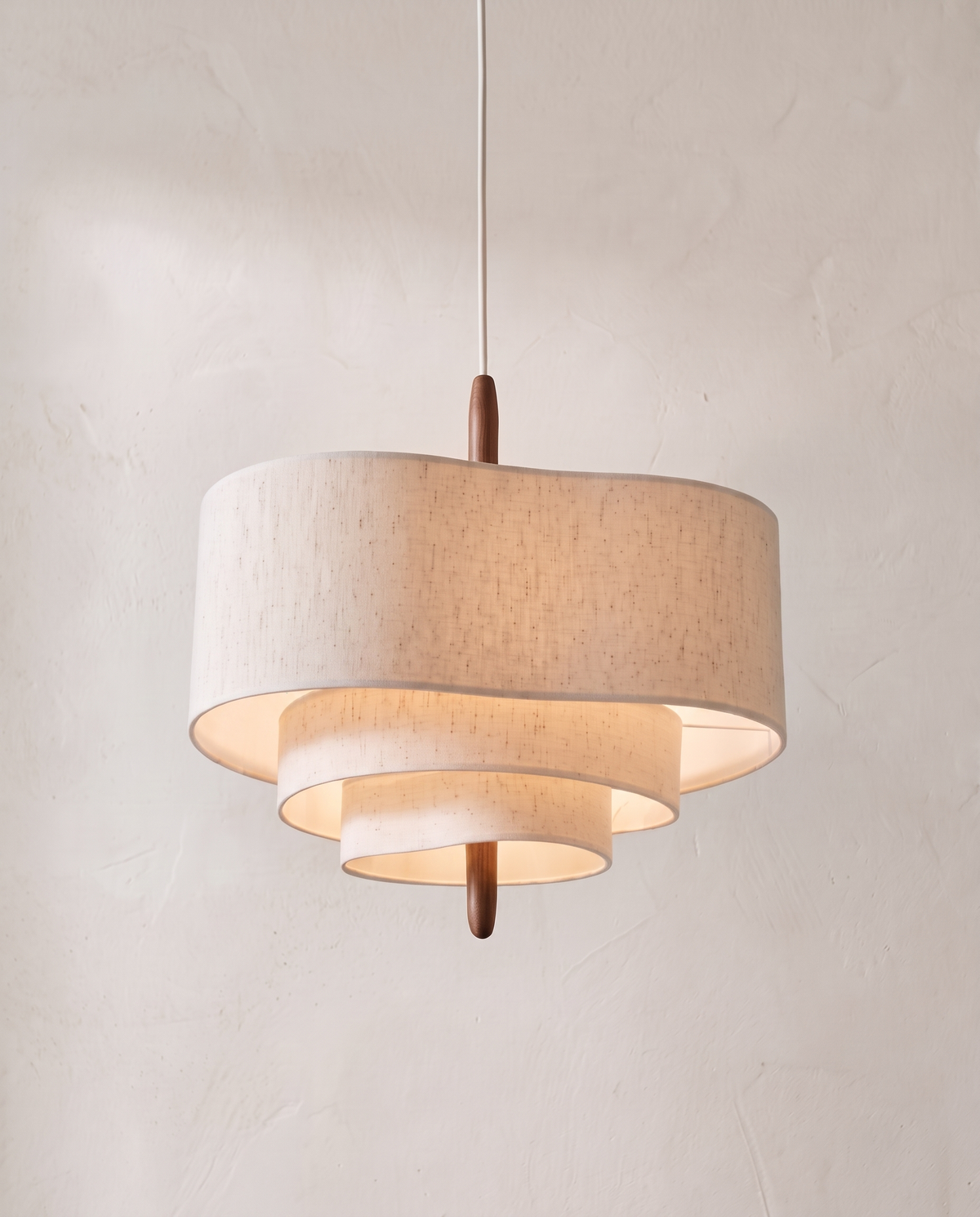 The Pagoda Pendant – 58 cm, three-tier beige fabric shade on a wooden stem
