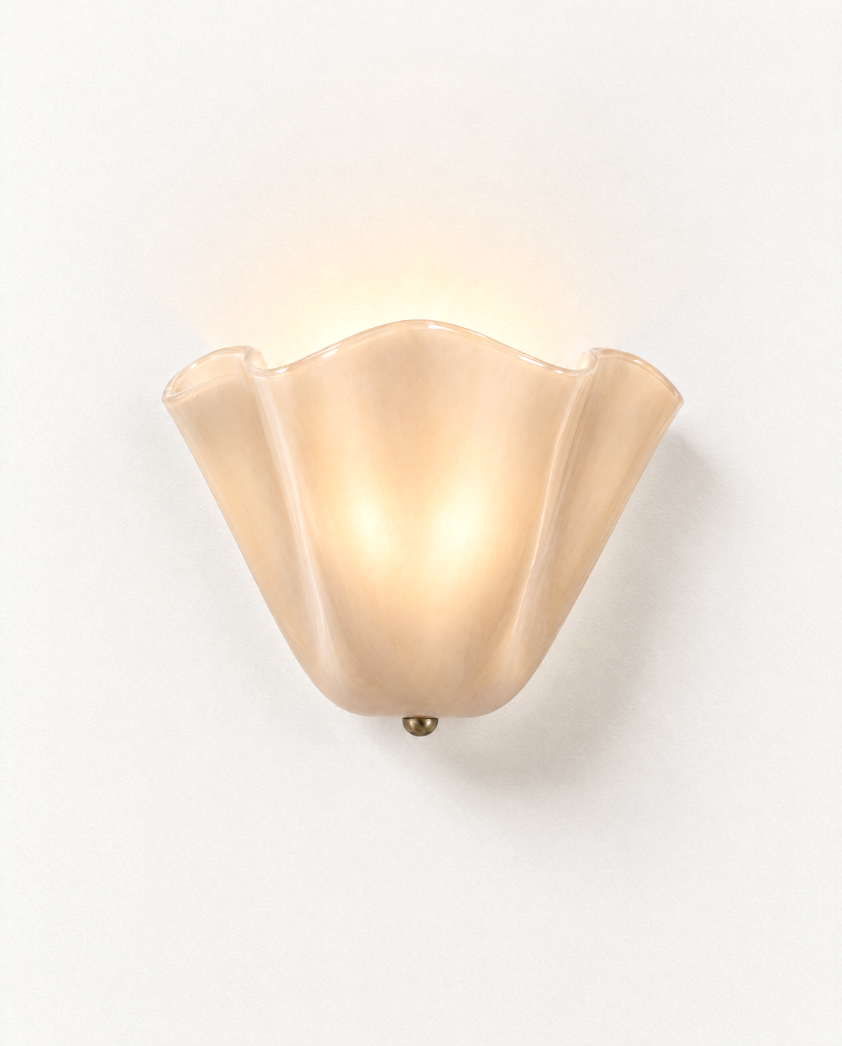 The Petal Wall Light – Oatmeal, sculpted warm oatmeal glass petal shade with a brass tip