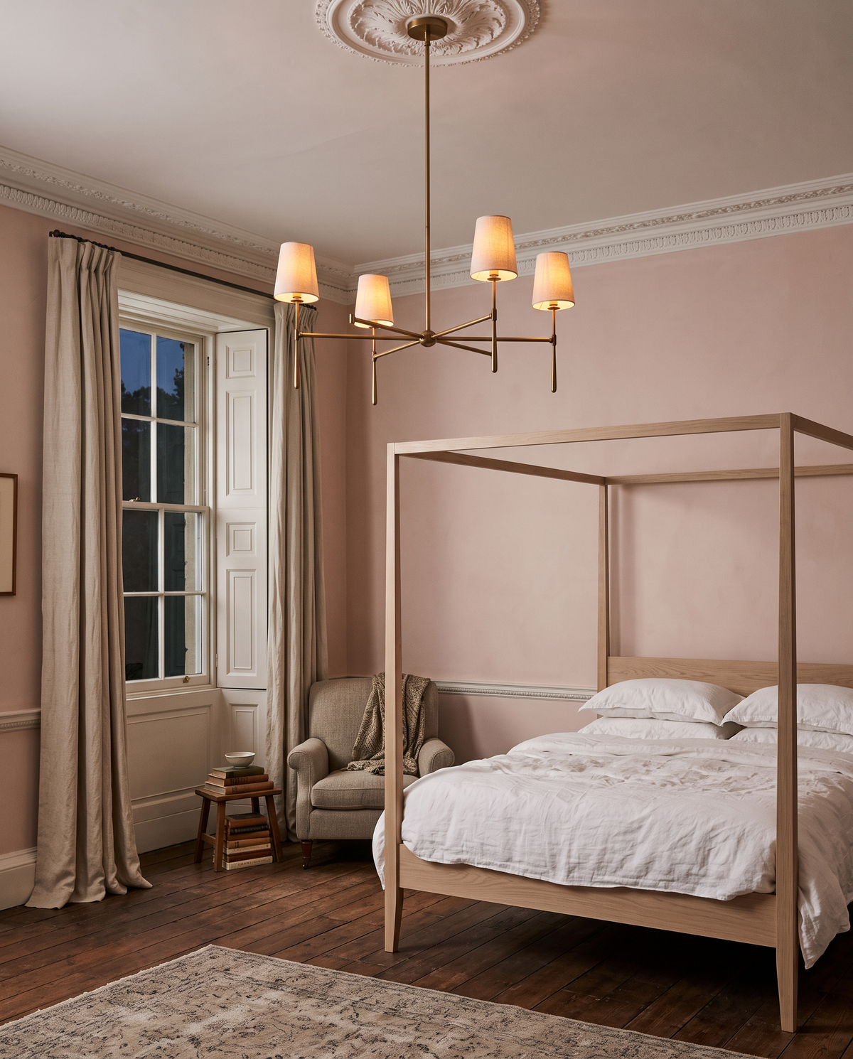 The Salon in a Georgian bedroom with a four-poster bed