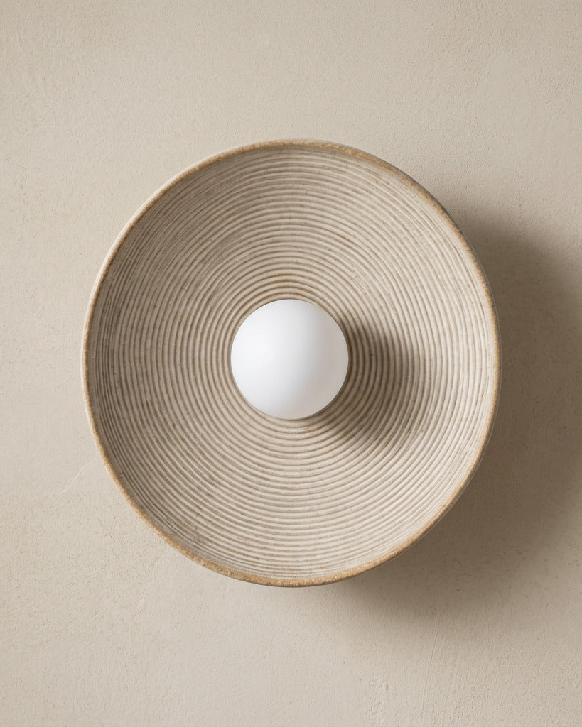 The Cocoon, rounded resin wall light, unlit, showing the sculptural curved form — Selden Home product photography