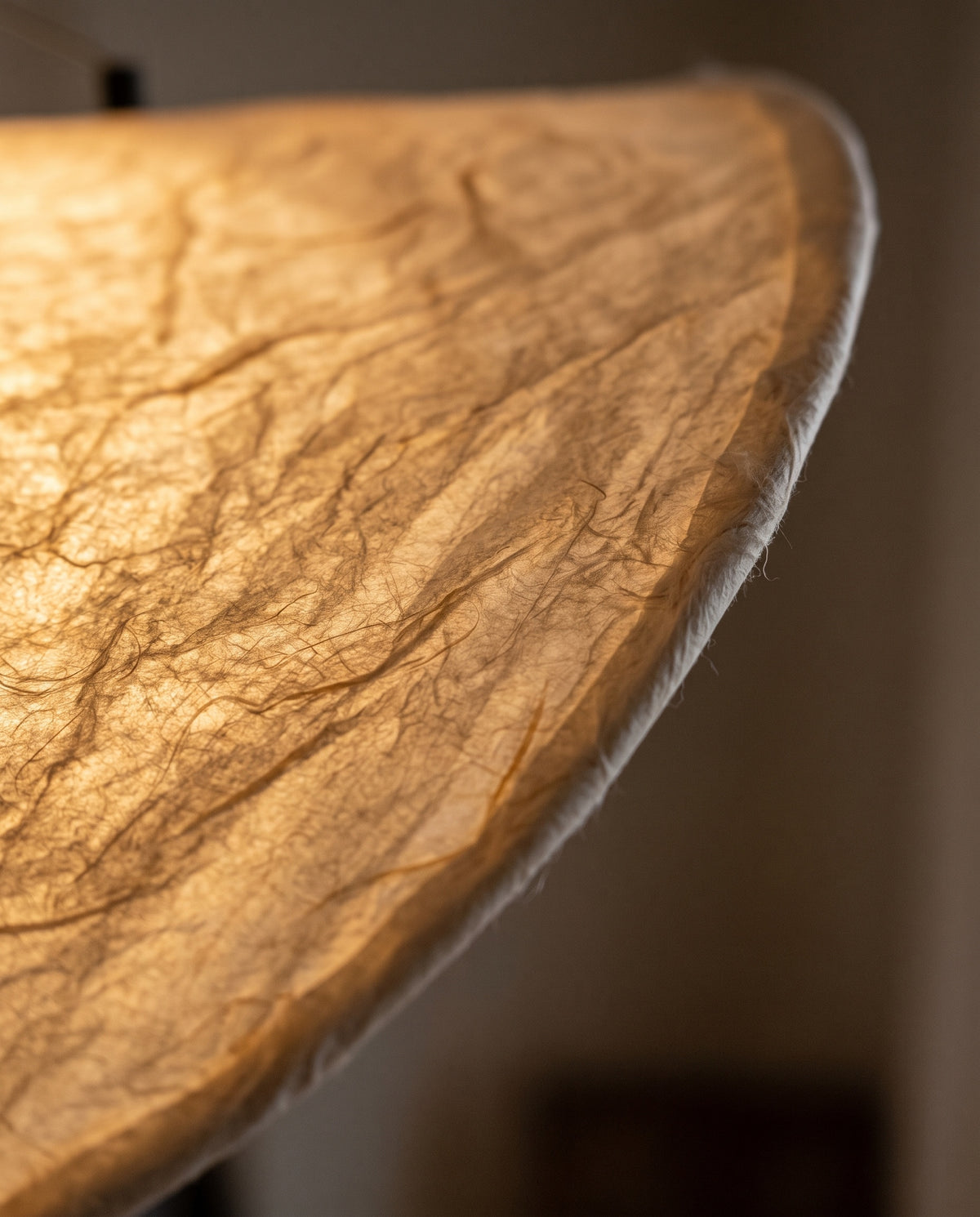 Close-up of the glowing creased paper of The Drift