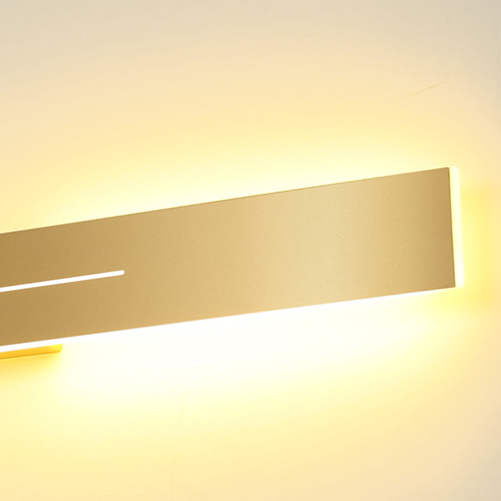 The Beam linear LED wall light, sand-finish gold face on a white body — Selden Home product photography (2)