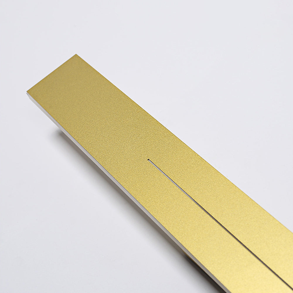 The Beam linear LED wall light, sand-finish gold face on a white body — Selden Home product photography (3)