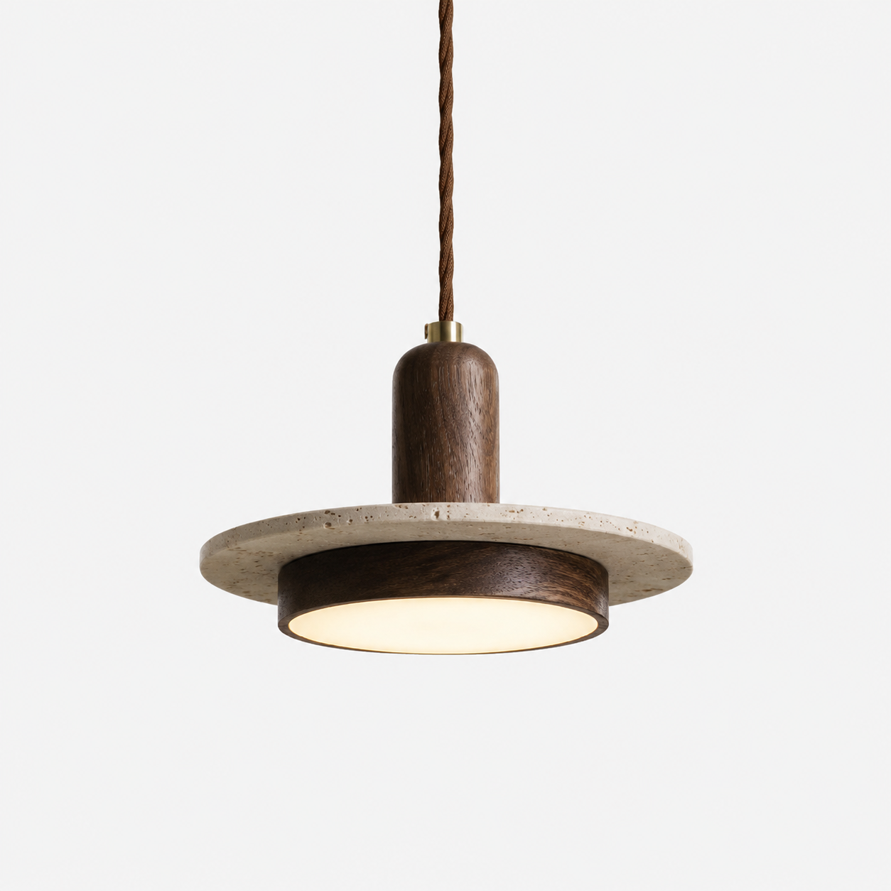 The Axis, travertine disc pendant light with a slim cylinder through its centre — Selden Home product photography