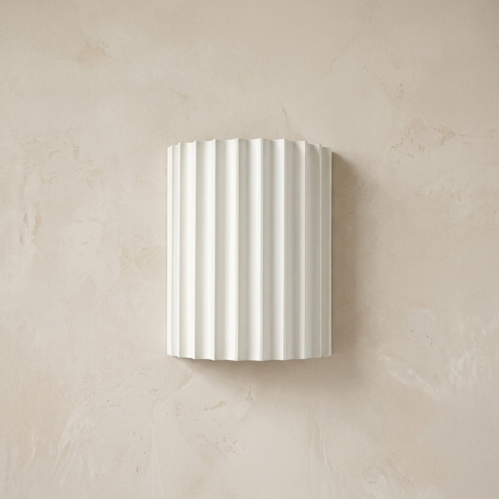 The Pleat, white fluted wall light on lime-washed plaster wall — Selden Home product photography