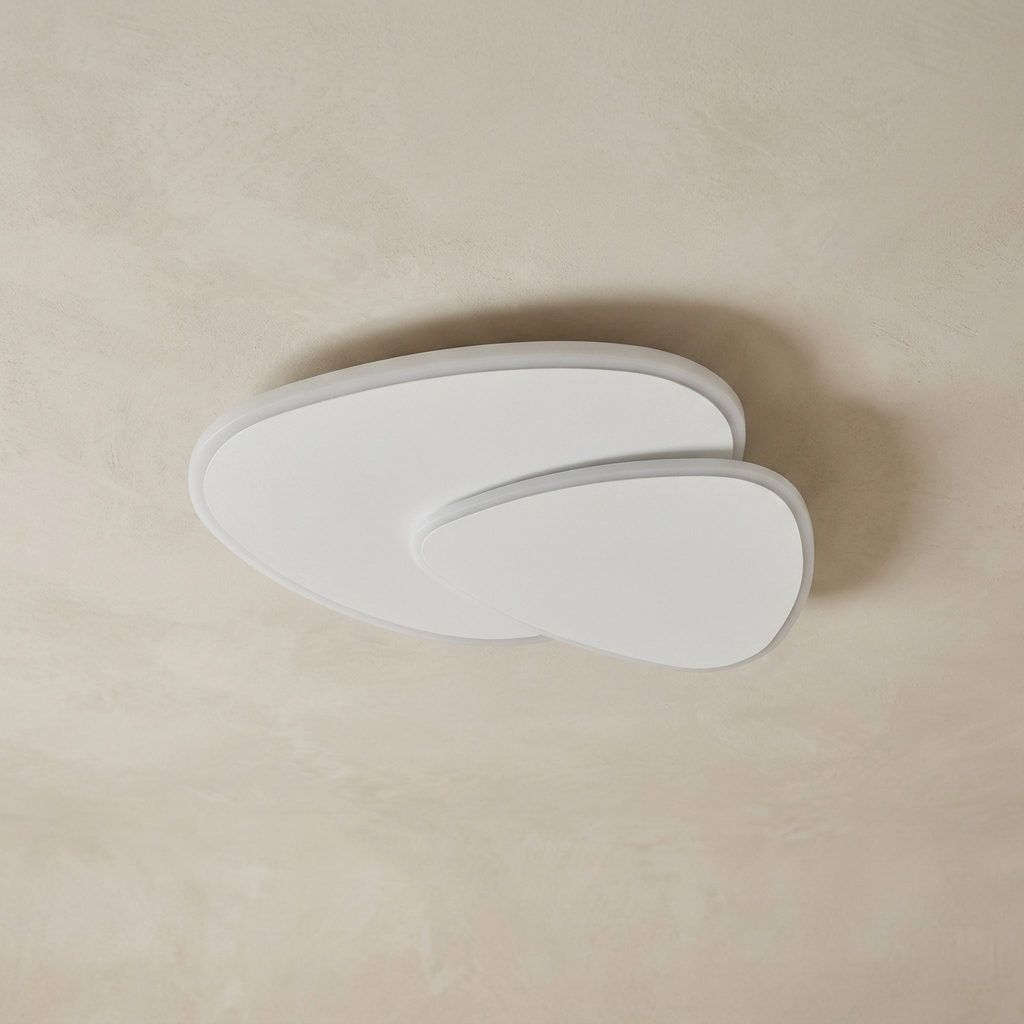 The Facet white flush-mount ceiling light, unlit, against a lime-washed plaster ceiling — Selden Home product photography