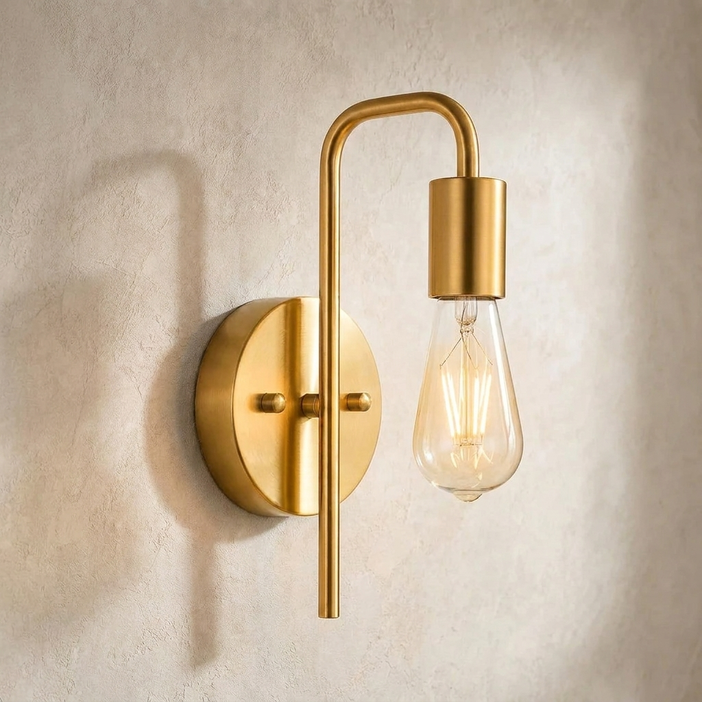 The Filament gold industrial wall sconce, close-up detail of arm and bulb holder — Selden Home product photography