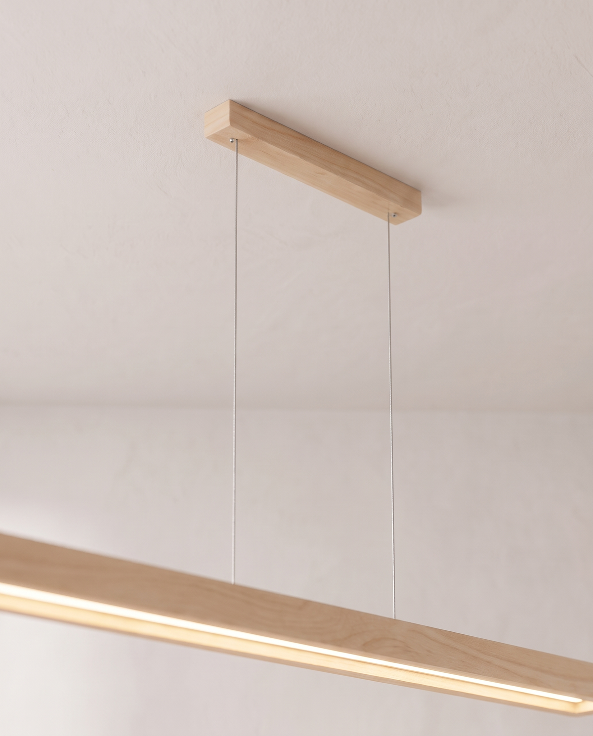 Close-up of The Joist's wood ceiling plate and suspension cables