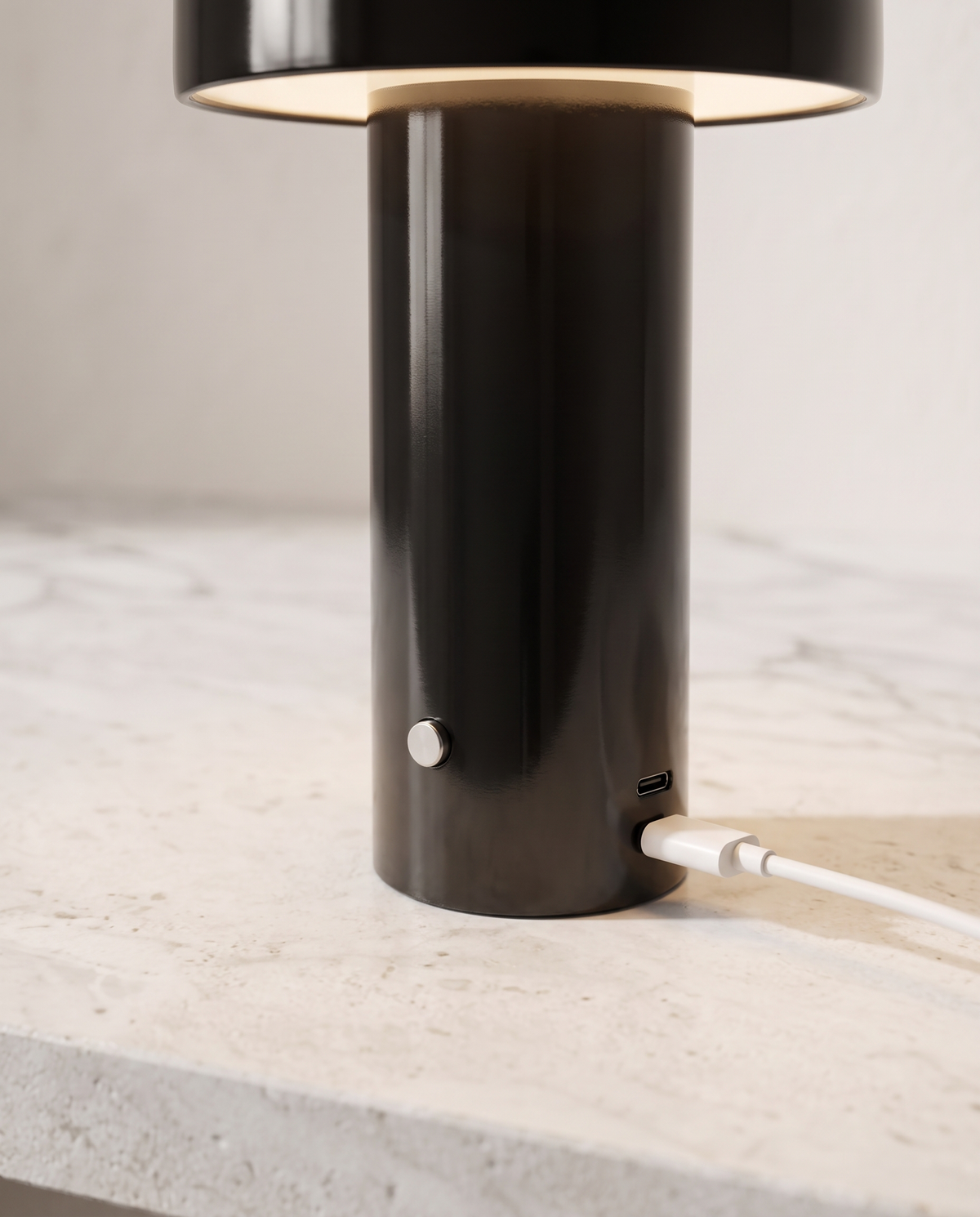 Close-up of The Bud's base with its USB-C charging cable