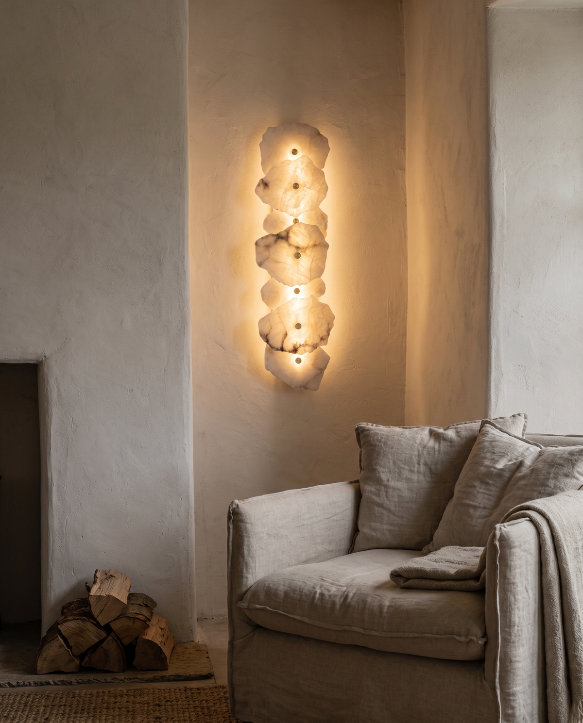 The Strata Wall Light with seven heads in a living room alcove beside the fireplace