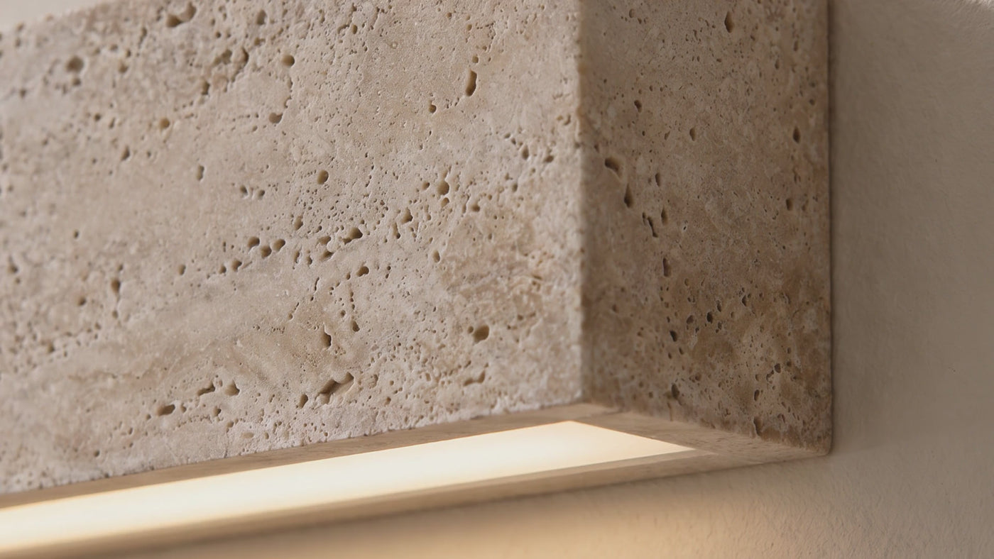 The Monolith Wall Light lit in British homes