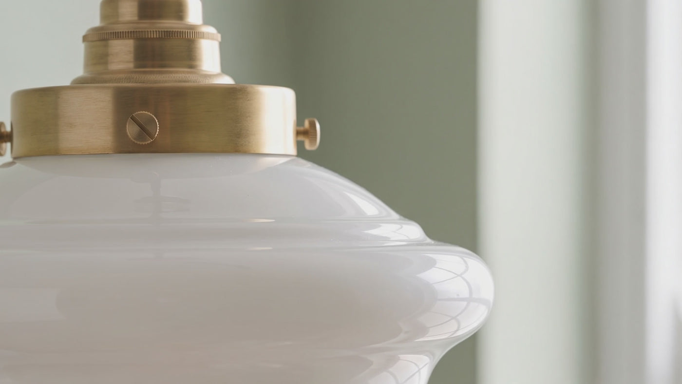 The Scholar opal glass pendant in a kitchen, hallway and landing