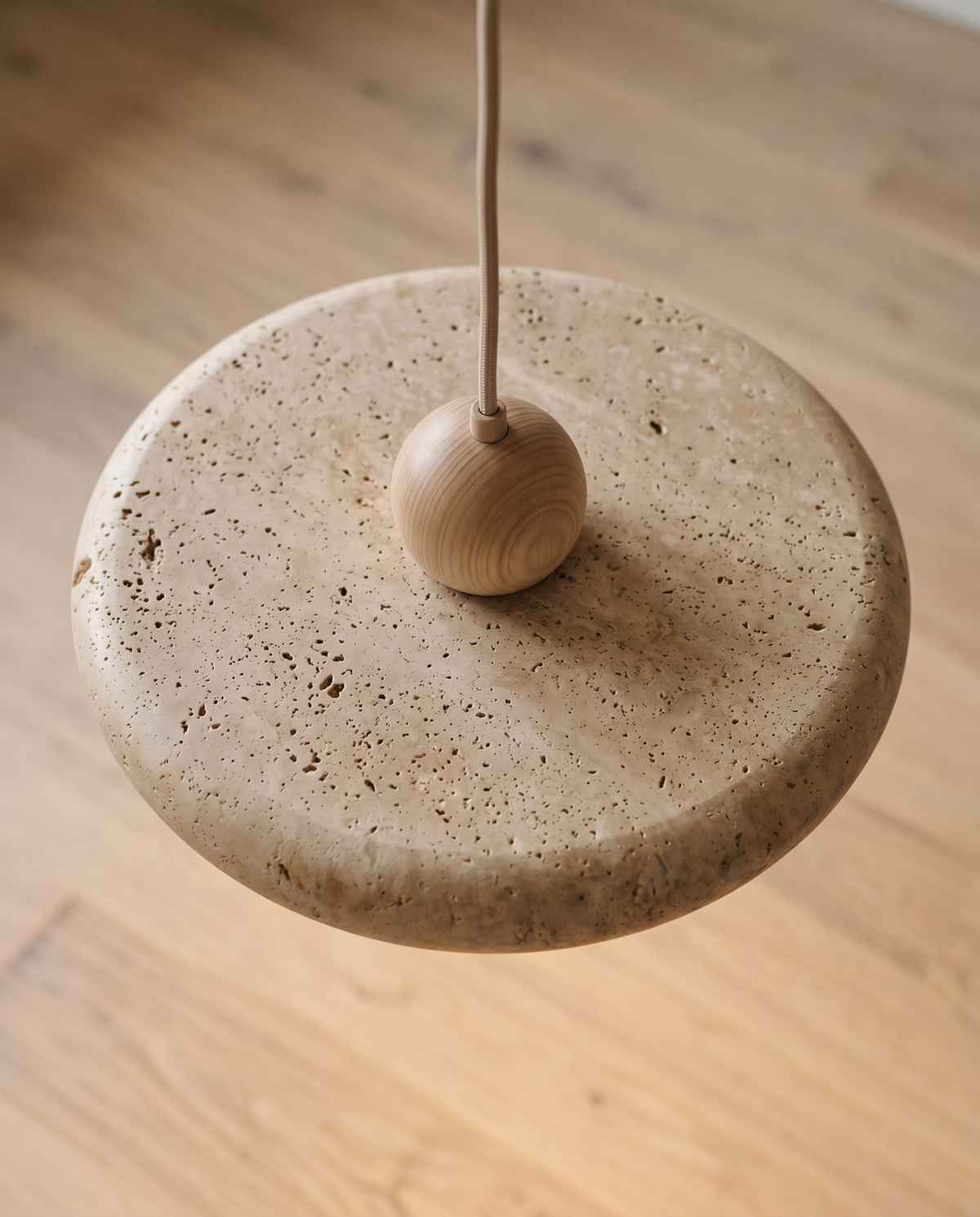 The Aperture travertine ring pendant – Close-up detail