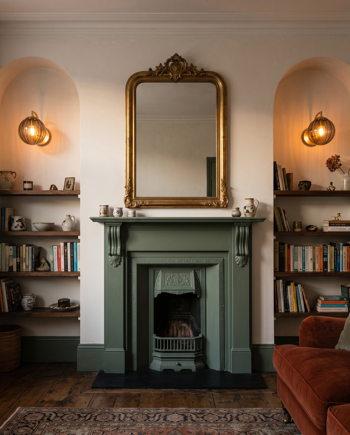 The Bloom wall sconces in smoke grey ribbed glass in the alcoves of a Victorian living room