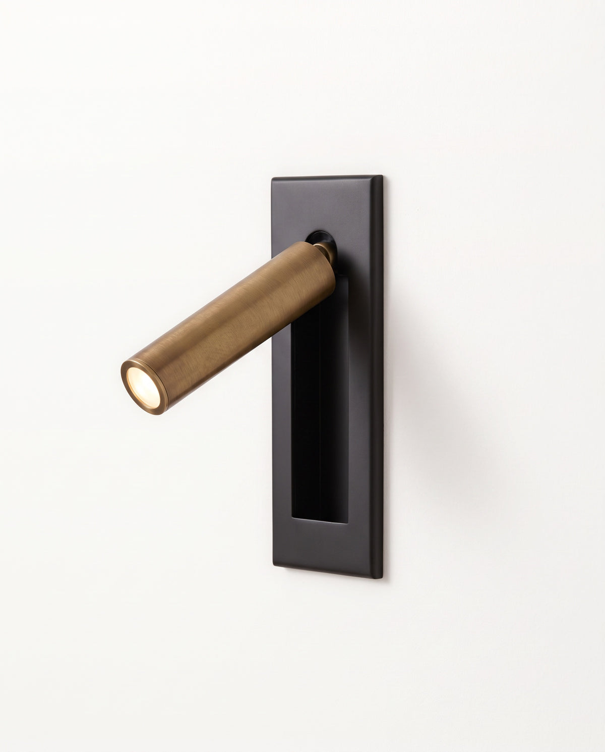 The Bookmark Wall Light in Bronze & Jet with a round arm
