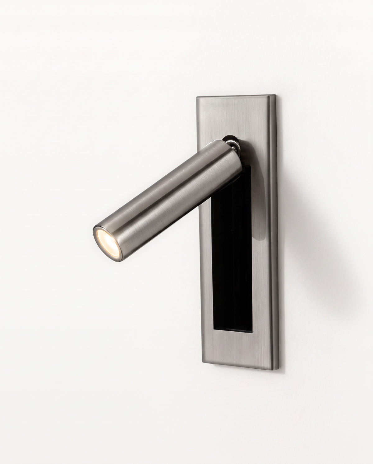 The Bookmark Wall Light in Satin Nickel with a round arm