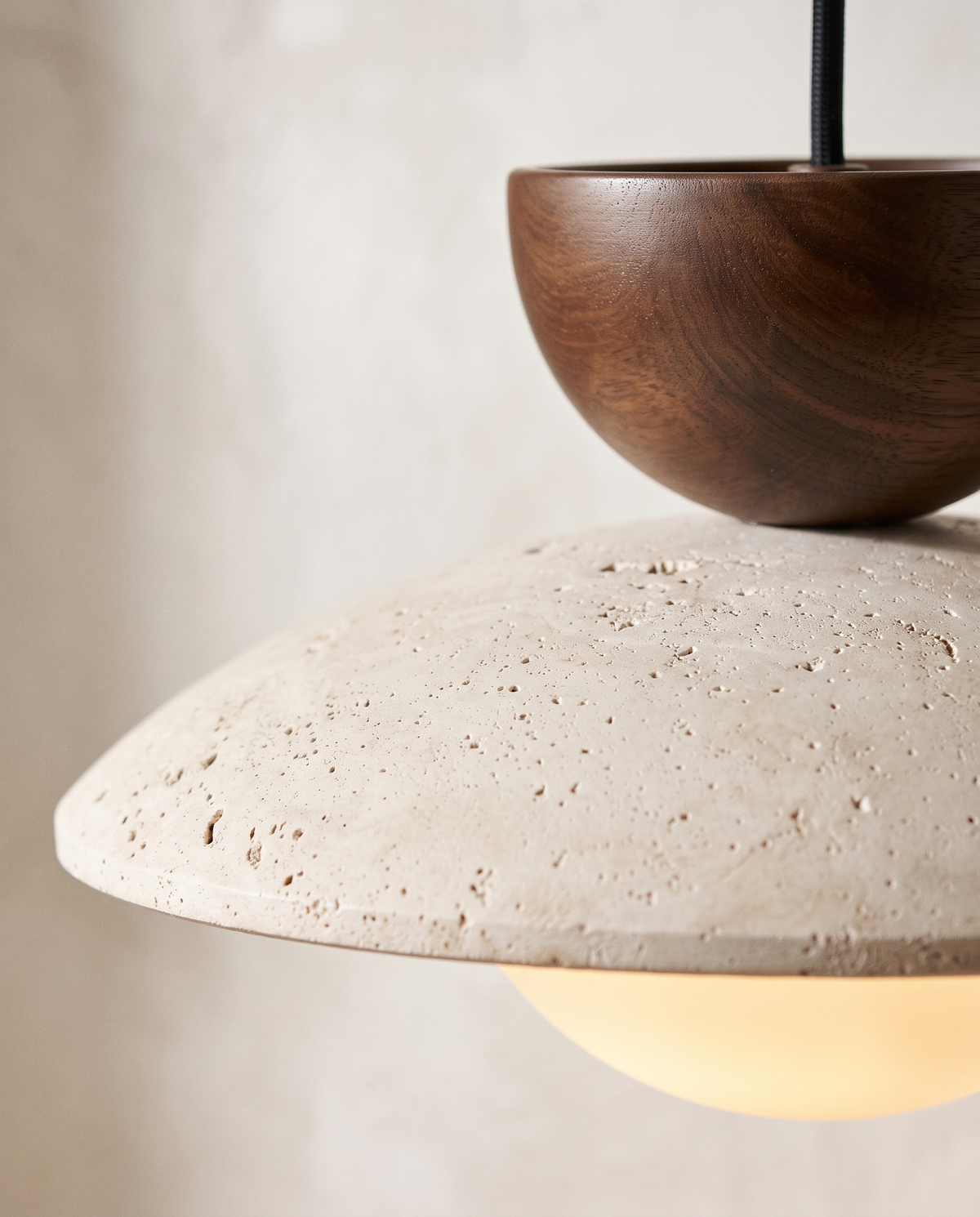 Close-up of the pitted travertine shade and Conker cap of The Brim