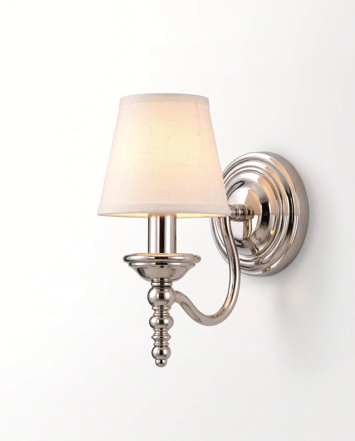 The Candlewick Wall Light in Polished Nickel with a small fabric shade
