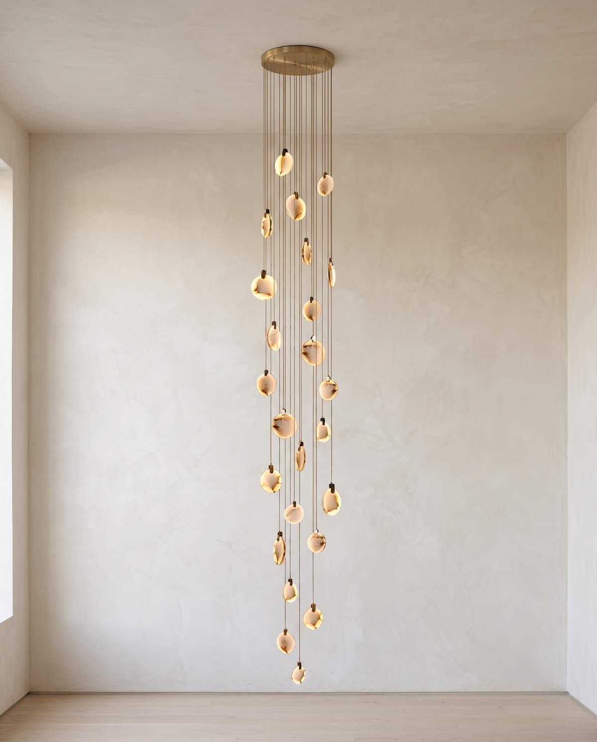 The Cascade alabaster disc chandelier for stairways — Selden Home (12)