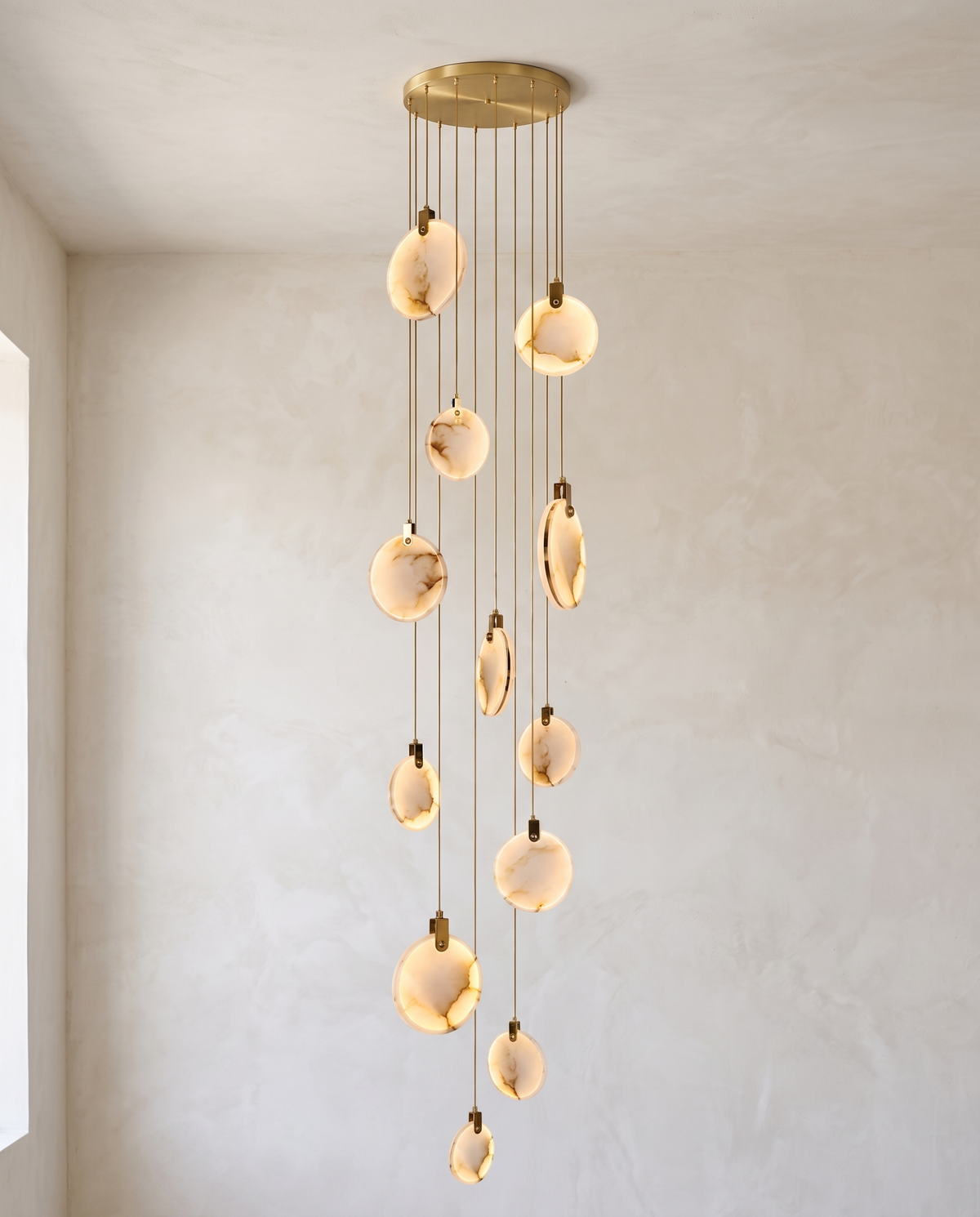 The Cascade alabaster disc chandelier for stairways — Selden Home (14)
