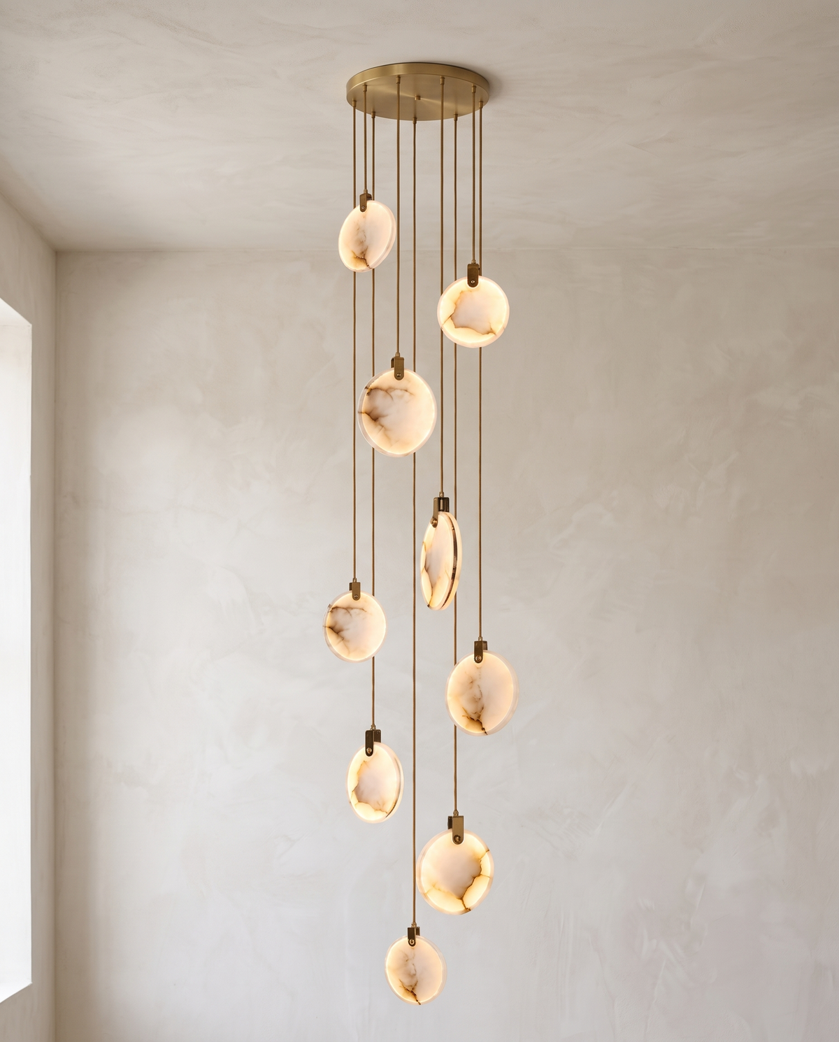 The Cascade alabaster disc chandelier for stairways — Selden Home (16)