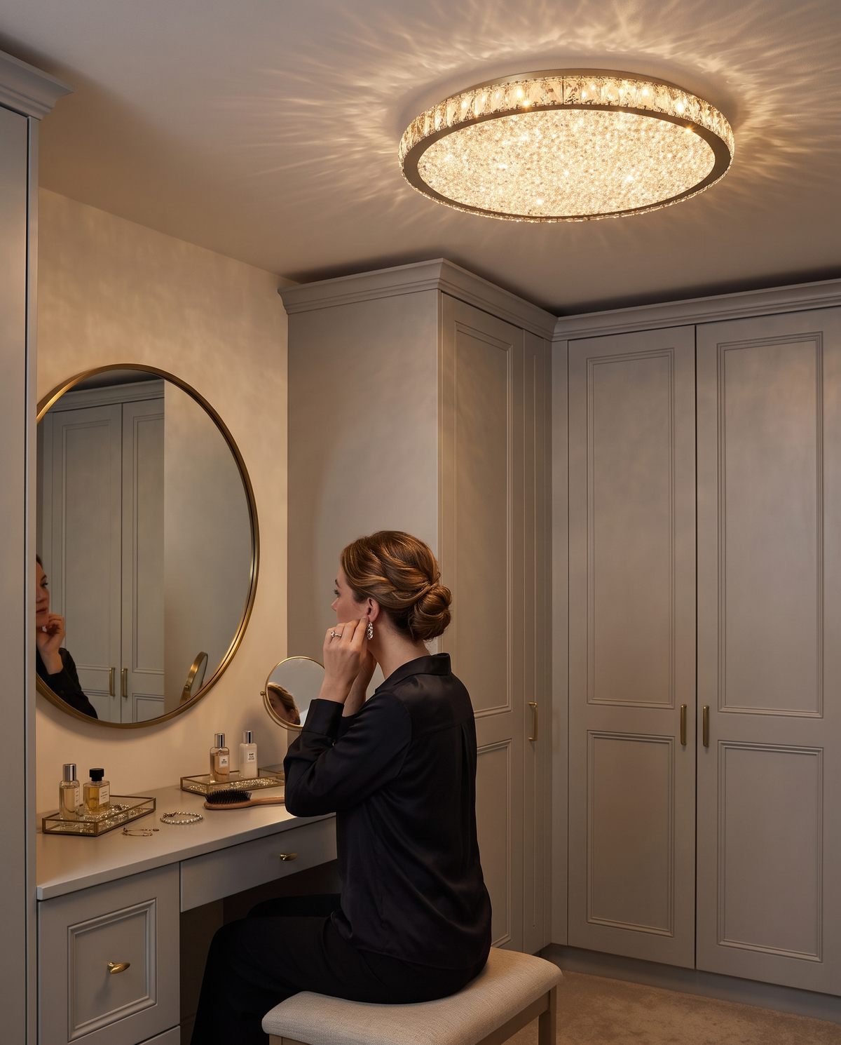 A woman at her dressing table under The Coronet in Champagne