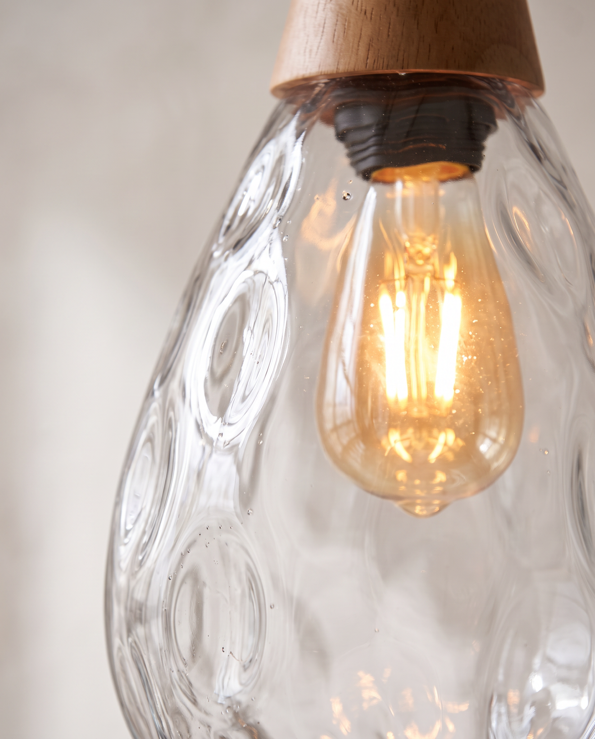 Close-up of the dimpled glass and bulb of The Dew