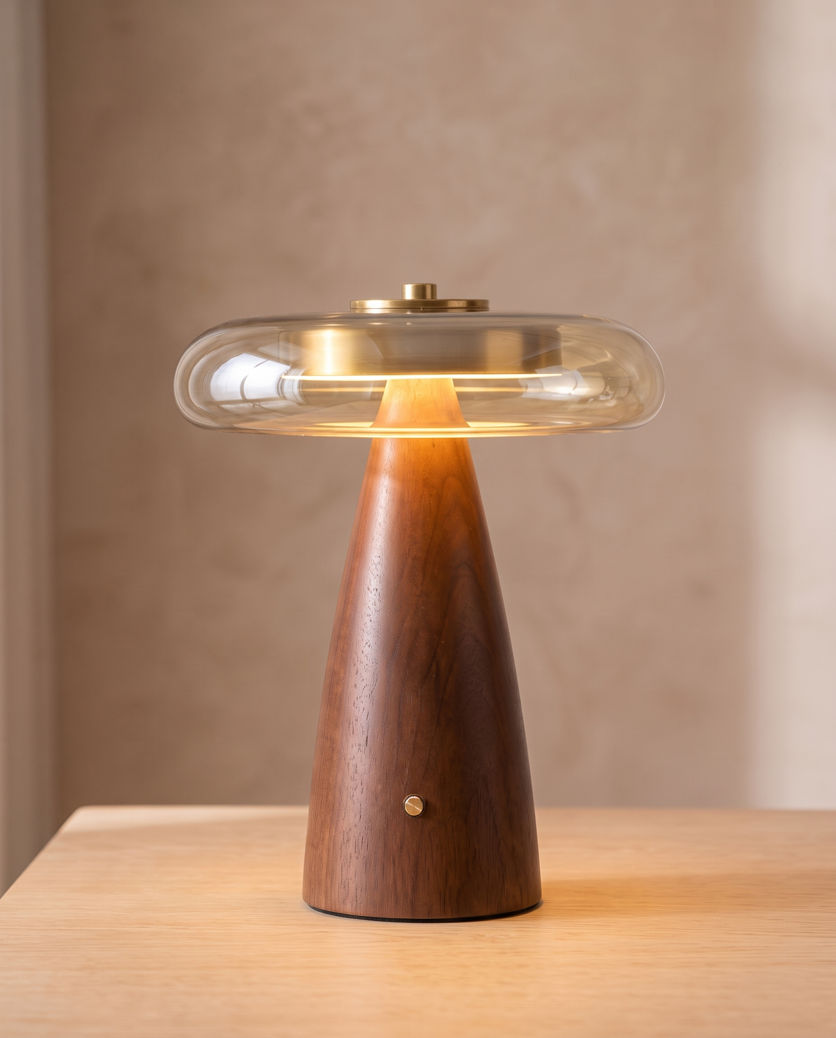 The walnut base and cognac glass disc of The Dovetail