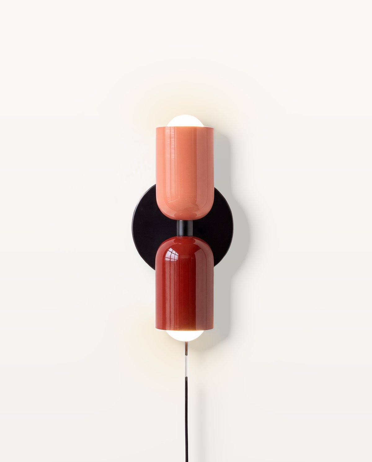 The Duet Plug-in Wall Light in Coral & Pillar Box