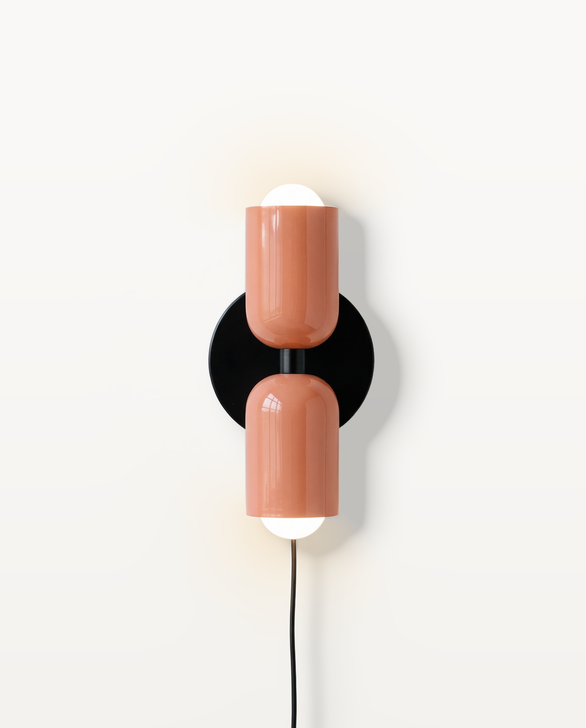 The Duet Plug-in Wall Light in Coral