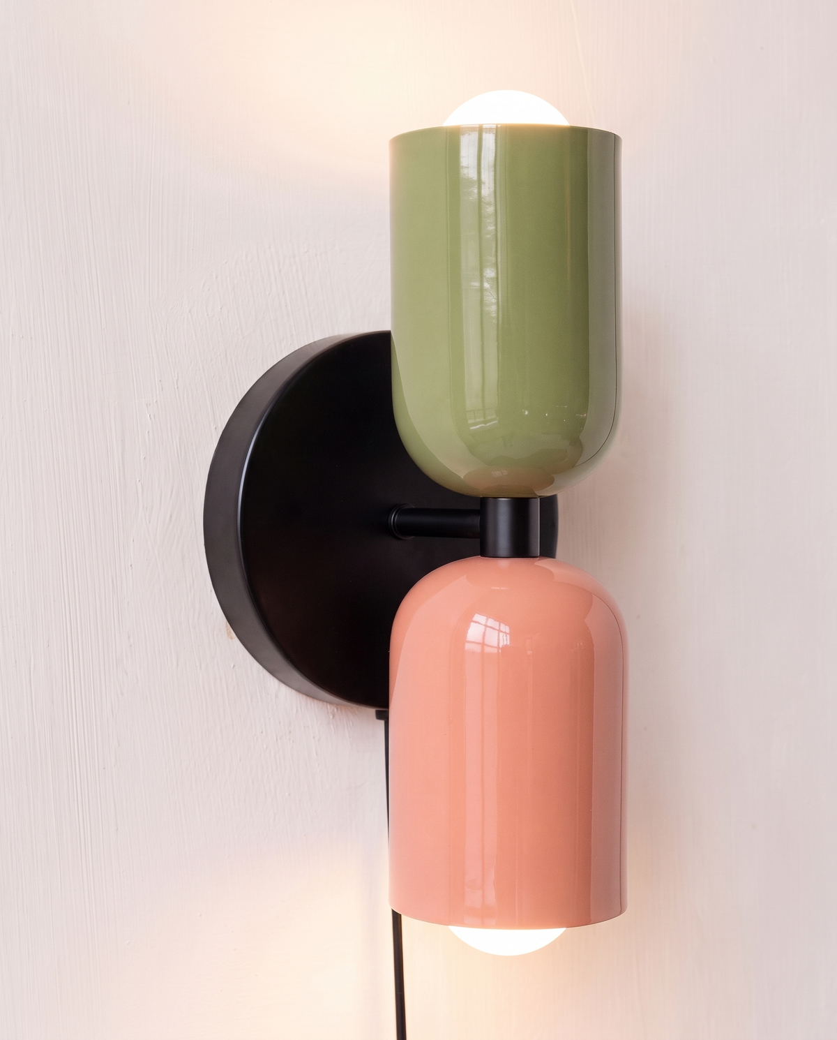 Close-up of the glossy enamelled shades of The Duet in Olive & Coral