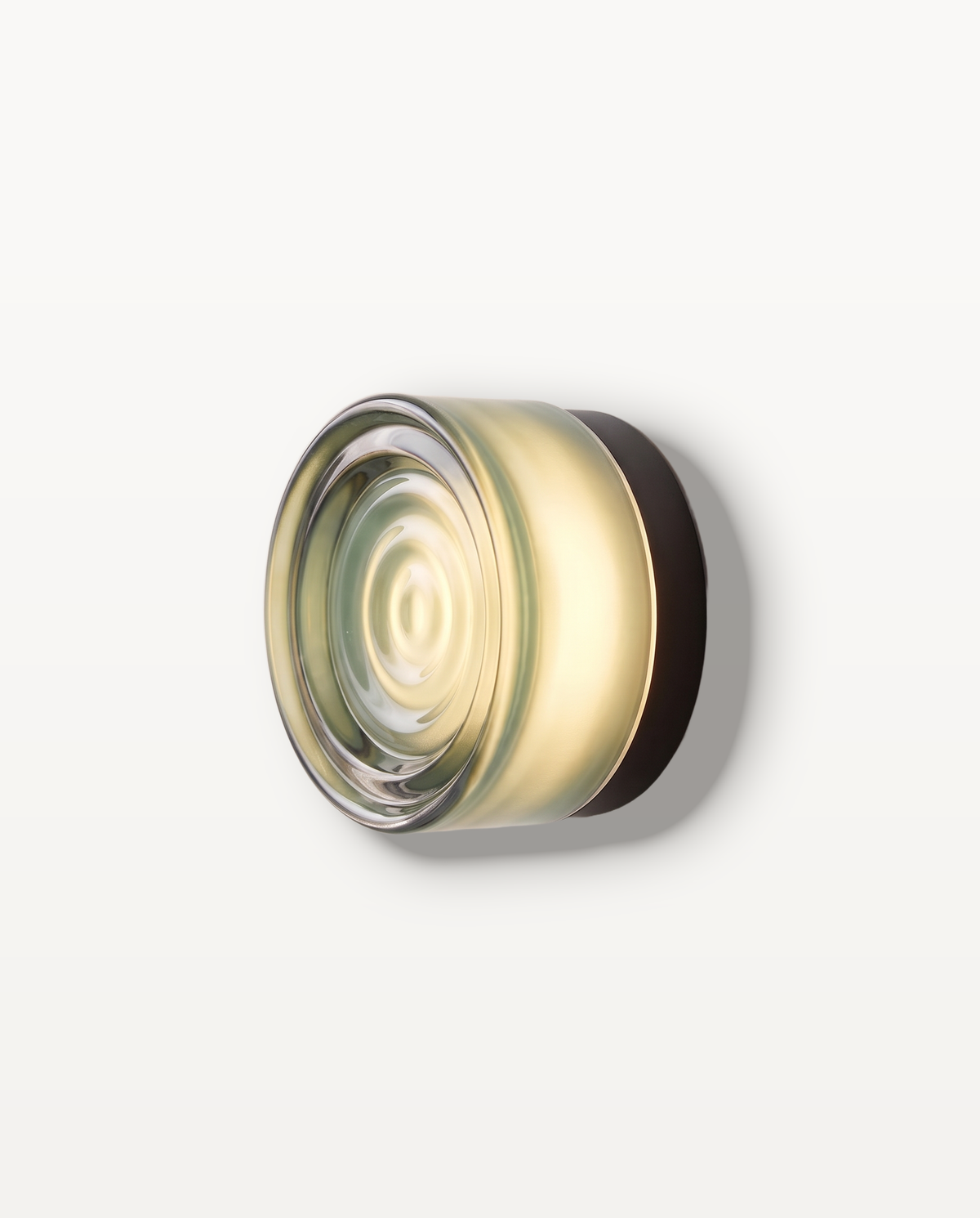 The Halo Wall Light – Celadon, pale celadon-green ringed glass, round solid pressed-glass wall light