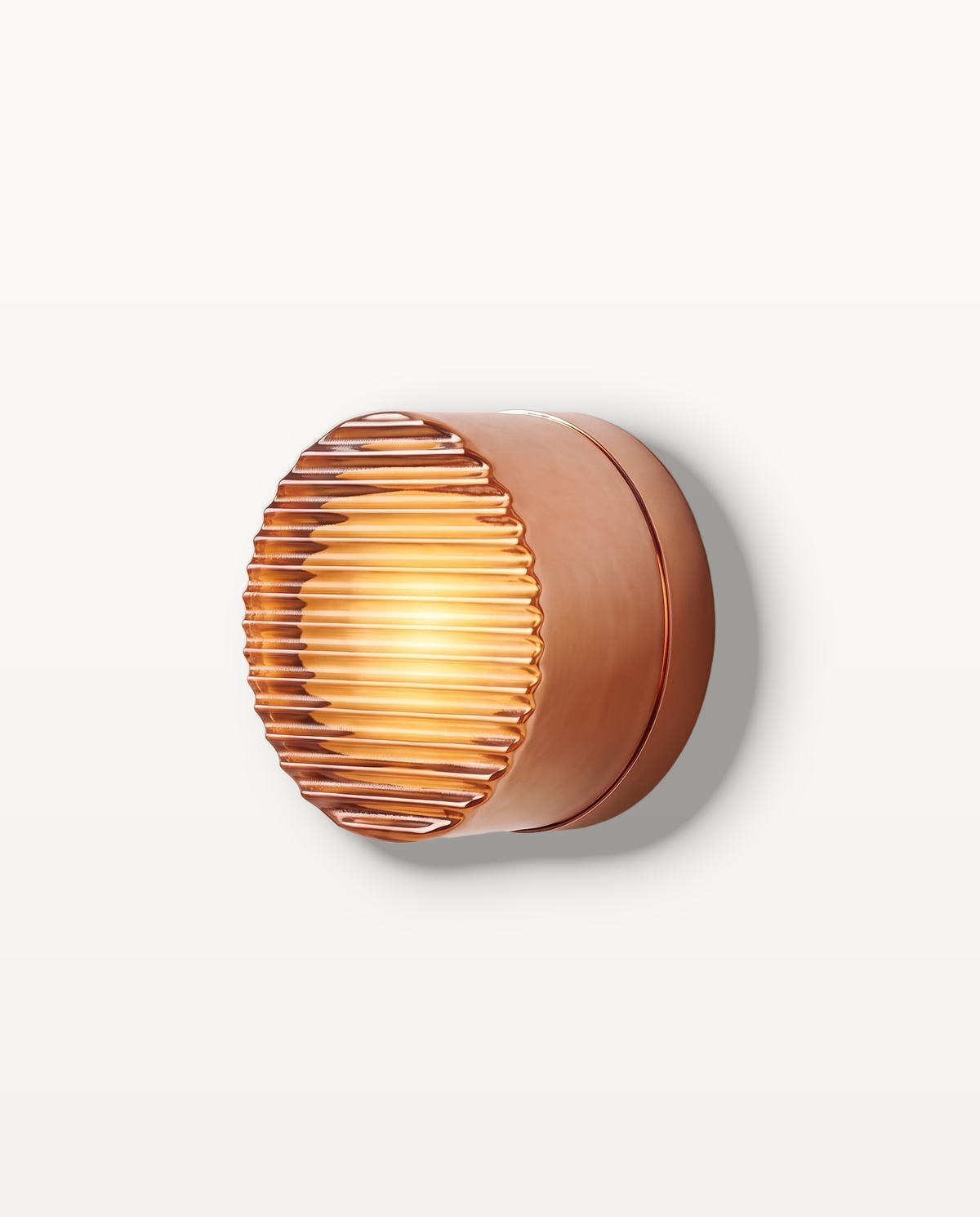 The Halo Wall Light – Cognac, ribbed amber-copper glass, round solid pressed-glass wall light